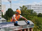 У Немишлянському районі ремонтують покрівлю житлових будинків